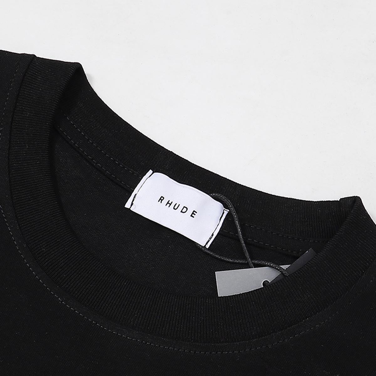 Rhude T-shirts Chevron Logo Repeat